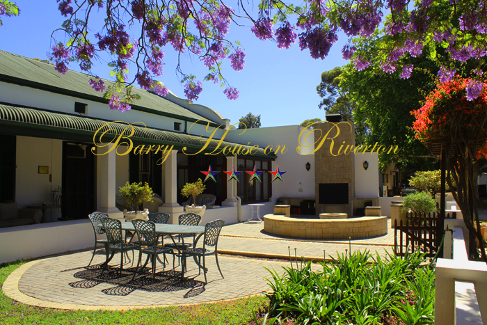 Barry House on Riverton - relax on the long veranda